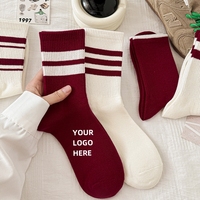 Vente en gros de chaussettes fines et chaudes en laine de haute qualité avec logo personnalisé pour femme blanc rouge à la mode