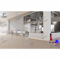 Structure d'escalade en nid d'abeille multi-niveaux Atrium Rope Net Playground, balançoires suspendues en maille colorée, centre de jeux commercial pour enfants OEM