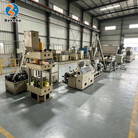 Machine entièrement automatique de fabrication de briques en plastique recyclé, ligne de production de blocs de pavage écologiques à emboîtement hydraulique haute pression