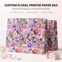 Sac en papier floral personnalisable et biodégradable RUIXIN, impression couleur CMYK/estampage à chaud, finition mate, poignées en ruban, logo, bougie