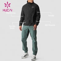 Veste de sport pour homme OEM HUCAI, fabriquée sur mesure, 100% nylon, coupe-vent, légère, réfléchissante, pour la course à pied et la salle de sport