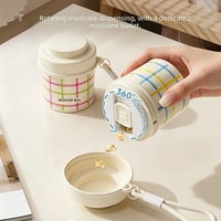 Boîte à pilules rotative à 4 compartiments en ABS, étanche à l'humidité, design minimaliste moderne, mini étui de voyage pour comprimés, médicaments, compléments alimentaires
