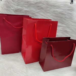 Red Glossy Paper Gift Bags Rope Handle Shopping <b>Packaging</b> Bags Custom Logo Retail Boutique Use Jewelry <b>Packaging</b> Bags with Logo - Product Image 3