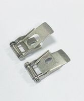 Clips à ressort pour luminaires, supports de montage pour panneaux de plafond