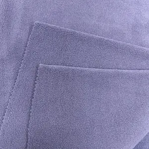 100% fibra de poliéster polar tejido cálido transpirable invierno chaquetas para hombre tela ecológica ropa tela para chaquetas