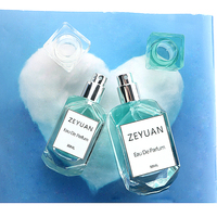 30ml 50ml Bouteille de parfum de luxe en verre transparent de haute qualité, vide, carré et clair en forme de pierre avec couvercle rectangulaire transparent en ABS