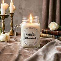 Bougie d'art luxueuse faite à la main en cire de soja avec pot en verre et poignée, idéale pour la Saint-Valentin et les mariages
