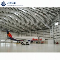 Hangar préfabriqué en acier JINGYI pour opérateur aéroportuaire, base fixe, aviation générale avec hélicoptère, design moderne