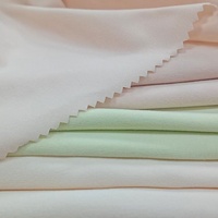 Tissu en flanelle lourde non élastique personnalisé en polyester pour le ponçage des bords, la tapisserie de canapé, les sous-vêtements, les vêtements et les textiles de maison