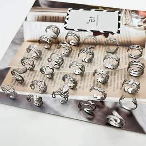 Multi-estilo europeo y americano ins viento abierto anillo de acero inoxidable corazón flor hueco puede ser incrustado accesorios de joyería - Product Image 5