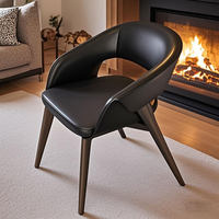 Fauteuil en cuir noir luxueux avec pieds en bois massif, adapté au salon, à la salle à manger, au bureau, à l'hôtel, au restaurant et à la villa