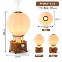 Diffuseur d'arômes 7 couleurs et haut-parleur Bluetooth avec bruit blanc apaisant, veilleuse montgolfière effet bois pour la relaxation en chambre