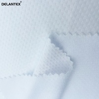 Tissu en maille bulle Delantex 100% polyester léger 90GSM doux pour doublure extérieure, couches pour filles et vêtements de mode