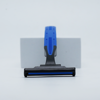 Rasoir à 2 lames en acier inoxydable avec poignée en caoutchouc, personnalisable avec impression de logo pour les articles d'hôtel