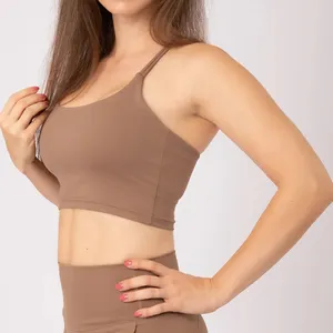 Reggiseno sportivo da donna con cinturino senza schienale Top da allenamento burrosa rimovibile imbottito per Yoga Crop Top medio impatto equilibrio incrociato reggiseno