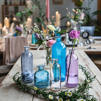 Vente en gros de vases à bourgeons de Offre Spéciale Vases à bourgeons décoratifs en verre coloré rustique pour mariage Petits mini centres de table à fleurs Vases en verre