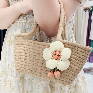 Woven bucket <b>bag</b> for women, <b>straw</b> braided, new spring/summer style, solid color, fresh and simple, perfect for vacation. Floral - Product Image 1