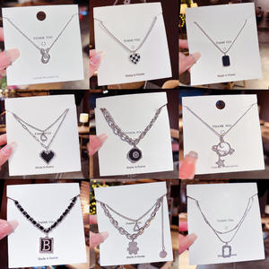 Collar de Moda con Baño de Plata y Circones de Cobre, Diseño de Joyería de Nicho Unisex para Verano, Colgante Deportivo con Cadena de Bambú, Regalo al por Mayor - Product Image 2