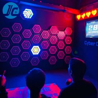 Mur d'activités interactif lumineux à LED en matériau PC activé pour salle de jeux, labyrinthe, arène, jardin, aéroport, parc de trampolines