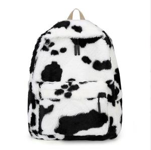 Mochila de viaje de felpa peluda con patrón de vaca lindo de color contraste mochila de piel de chica de ocio estilo Harajuku coreano - Product Image 1