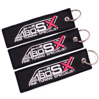 Porte-clés de voiture brodé avec ailes d'ange tissées, Logo personnalisé, étiquettes à Jet sur fond noir