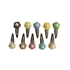 Épingle à cheveux pour enfants, accessoires de cheveux vintage bronze perle fleur BB clip anneaux de cheveux vente en gros petites filles frange douce poignée de cheveux