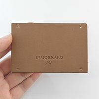 Étiquettes personnalisées en cuir véritable écologiques, thermocollées pour jeans, étiquettes de vêtements à coudre, vente en gros OEM