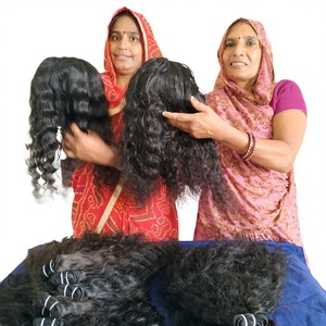 Venta al por mayor 100% extensiones de cabello humano indio virgen natural paquetes ondulados sedosos cabello Remy grado del vendedor mejor oferta de cabello humano - Product Image 1