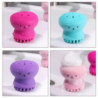 Brosse nettoyante visage en silicone en forme de pieuvre, double tête, éponge méduse pour le nettoyage du visage, le démaquillage et le massage - Vente en gros - Usage commercial