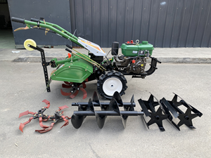Mini Tractor a pie de gasolina <span class=keywords><strong>con</strong></span> dos ruedas, tractor de mano, timón rotativo agrícola fabricado en China - Product Image 2