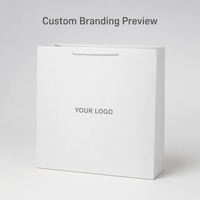 Sac cadeau en papier blanc avec poignées en corde torsadée, emballage de vente au détail pliable pour événements, boutiques et présentation de marques