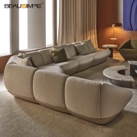 Canapé modulaire incurvé minimaliste italien inclinable I-side en tissu bouclé avec garniture en cuir pour salon et villa