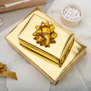 Gold Wrapping Paper Roll - 17 In X 32.8 Ft(46.5 sq.ft.) Metallic Gold Solid Color Gift Wrap with <b>Grid</b> Cutting Lines - Product Image 1