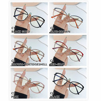 Vente en gros de montures de lunettes en alliage doré avec cercle transparent rouge uni pour femmes et filles 2025 Charnière à ressort Style œil de chat pour la lecture