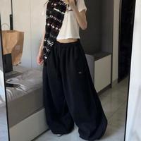 Pantalon de jogging ample gris pour femme avec cordon de serrage, taille élastique, style streetwear, pantalon ballon pour l'entraînement