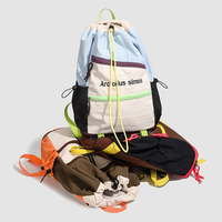 Sac à dos de voyage léger à blocs de couleur 20-35L en polyester unisexe, sac à dos de grande capacité