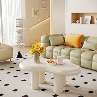 Table basse moderne de 39,4 pouces, jolie table basse crème avec 4 pieds solides, table à thé minimaliste funky (blanc) pour salon