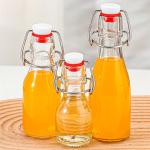 Bouteille en verre carrée de 50 ml, 100 ml, 3,5 oz pour eau, jus, bière, liqueur, décoration d'intérieur, avec bouchon à bascule en acier inoxydable 304/201 - Product Image 1