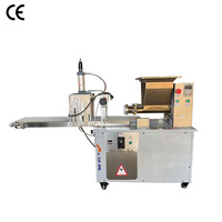 Machine automatique de fabrication de pâte à biscuits Extrudeuse de pâte à biscuits pour emporte-pièce