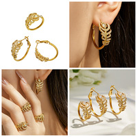 Bague et boucles d'oreilles en acier inoxydable plaqué or sans ternissement, incrustées de zircon en forme de plume, bijoux de luxe tendance pour femmes, vente en gros