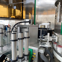 Machine d'étiquetage d'autocollants OPP entièrement automatique pour bouteilles en PET