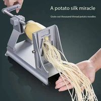 Légumes râpés et tranchés, machine à râper les pommes de terre en mille morceaux, restaurant de fondue, rouler et tordre, machine à râper extra longue