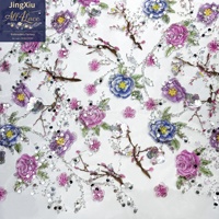 Tissu en dentelle de tulle brodé de sequins et de perles, motif floral multicolore de roses, idéal pour robes de mariée et robes de soirée