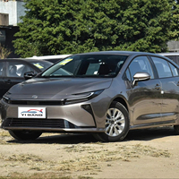 Toyota Corolla Cross 2.0L Hybride Édition Elite Véhicule d'occasion SUV Compact Traction Avant avec Toit Ouvrant Panoramique Transmission Automatique Électrique