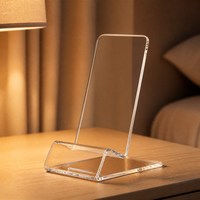 Support de téléphone moderne en acrylique avec affichage transparent et surface polie pour bureau et décoration intérieure