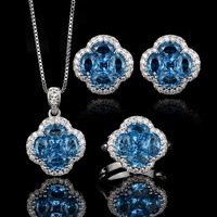 Ensemble de boucles d'oreilles et collier en spinelle bleue, trèfle à quatre feuilles, accessoires de mode féminins, nouveau, vente en gros, en cuivre, luxe léger