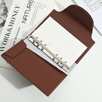 Carnet de notes à feuilles mobiles A6 en cuir PU souple et élégant moderne Carnet de notes de planificateur de Journal de conception magnétique multifonctionnel personnalisé