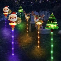 Nouvelles lumières de Noël solaires pour pelouse, décorations colorées de Père Noël et de rennes pour une ambiance festive