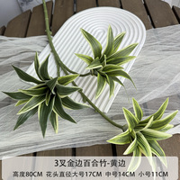 Fleurs artificielles en pot pour la décoration de hall d'hôtel et de mariage : Lys à trois branches à bord doré et plantes vertes de bambou – Durables et écologiques