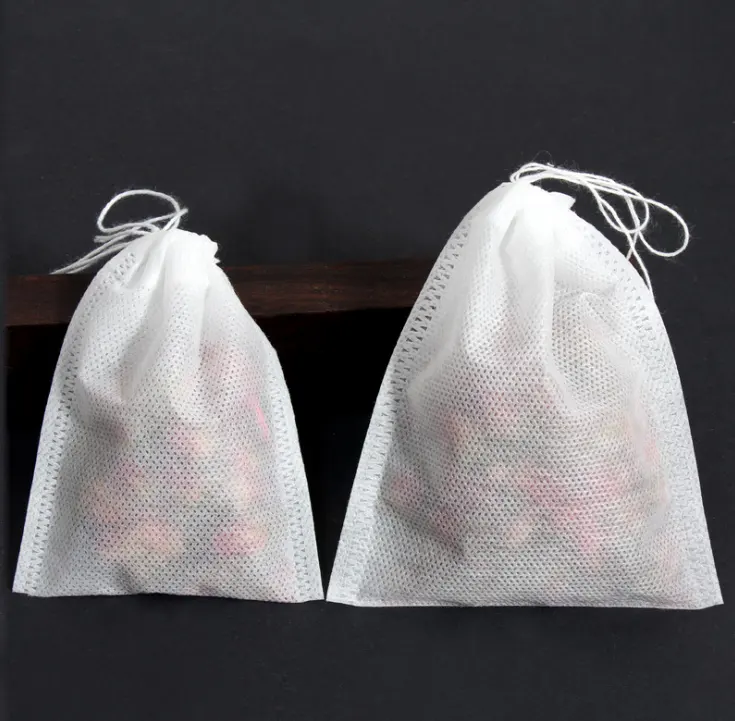 Bolsas de té vacías con sello de cordón, papel de filtro de fibra de maíz no tejido, venta al por mayor